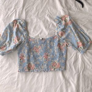 Brand New only worn twice. Cropped but comfortable